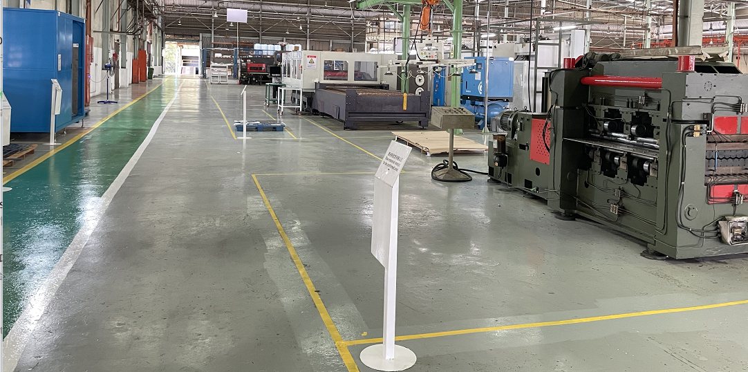ACE Malaysia sheet-metal shop floor with laser cutting and shearing machines