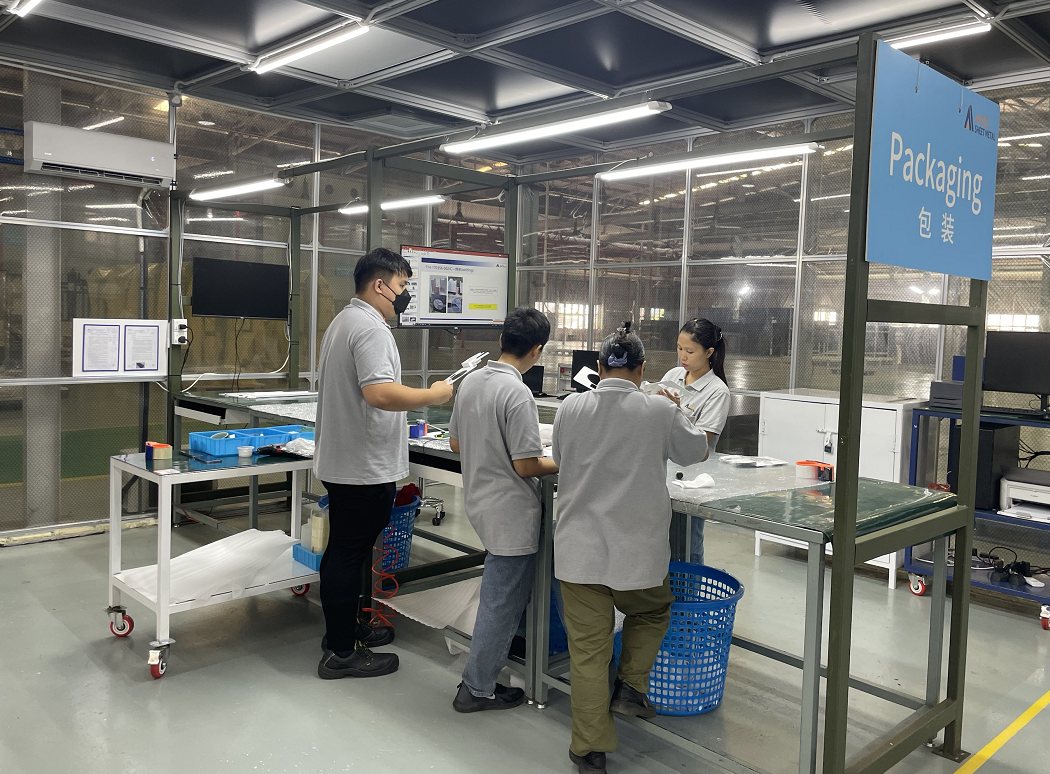 Inspection and packaging area at ACE Malaysia
